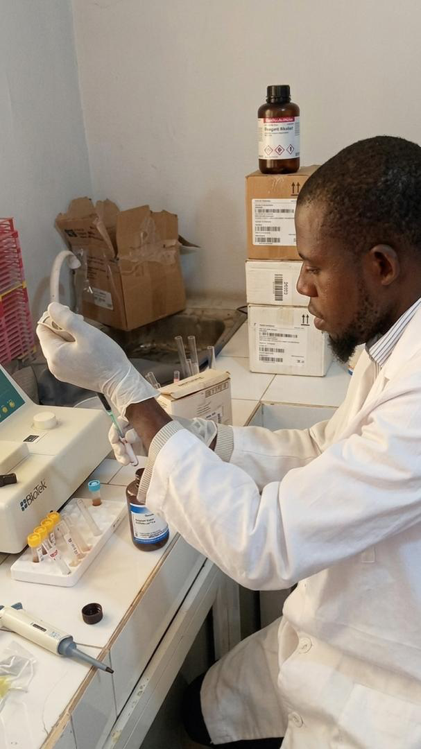 Yemkem laboratory technician pipetting a sample